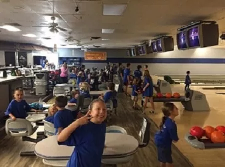 Kids Klub students bowling 